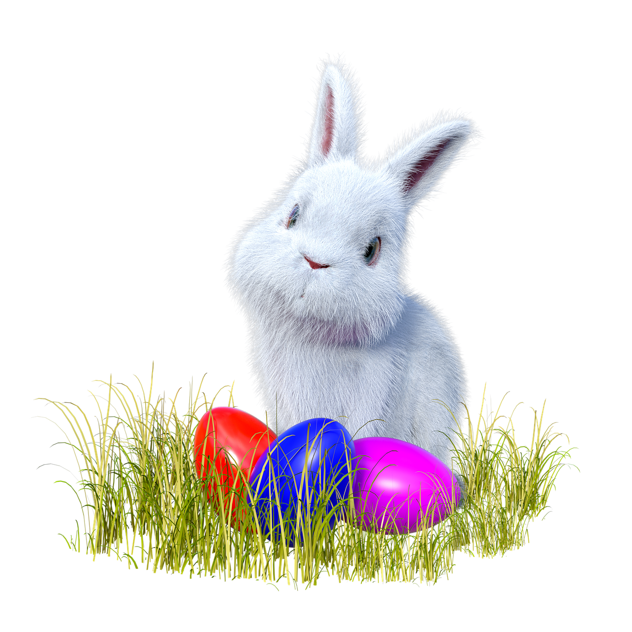 A white bunny in a field with bright Easter eggs in front of it