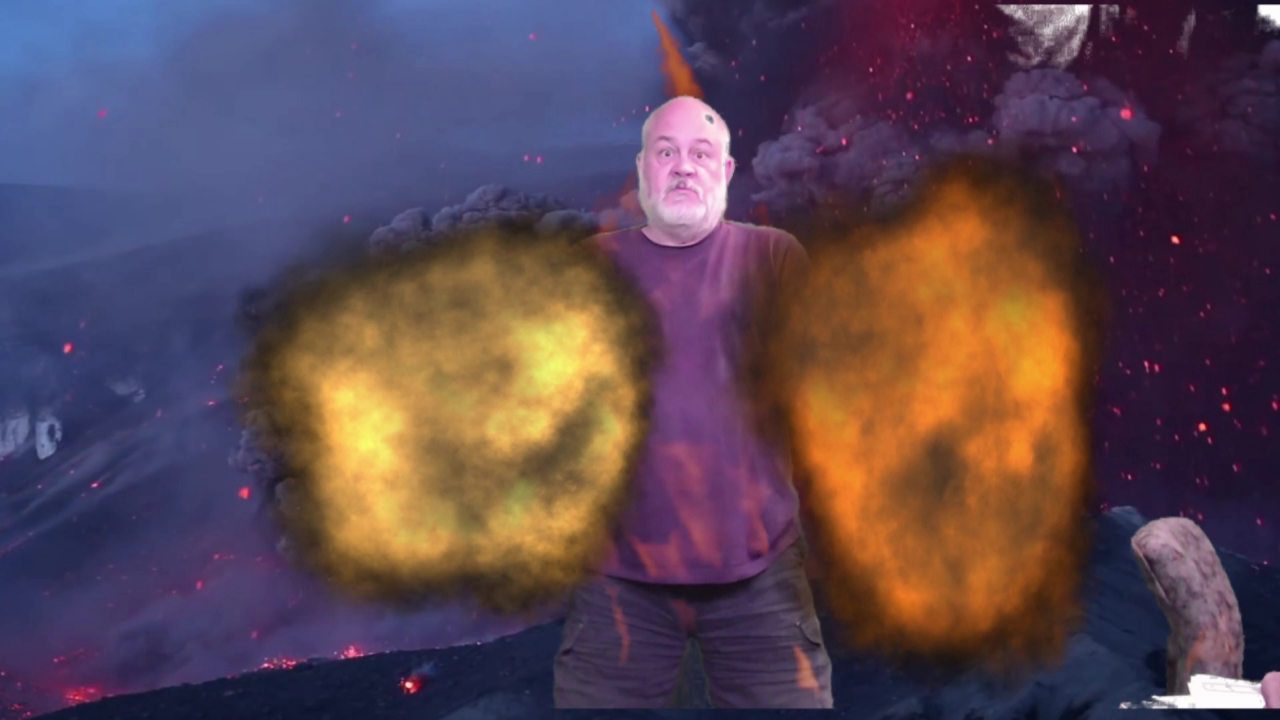 A man with odd-coloured magical fire in his hands