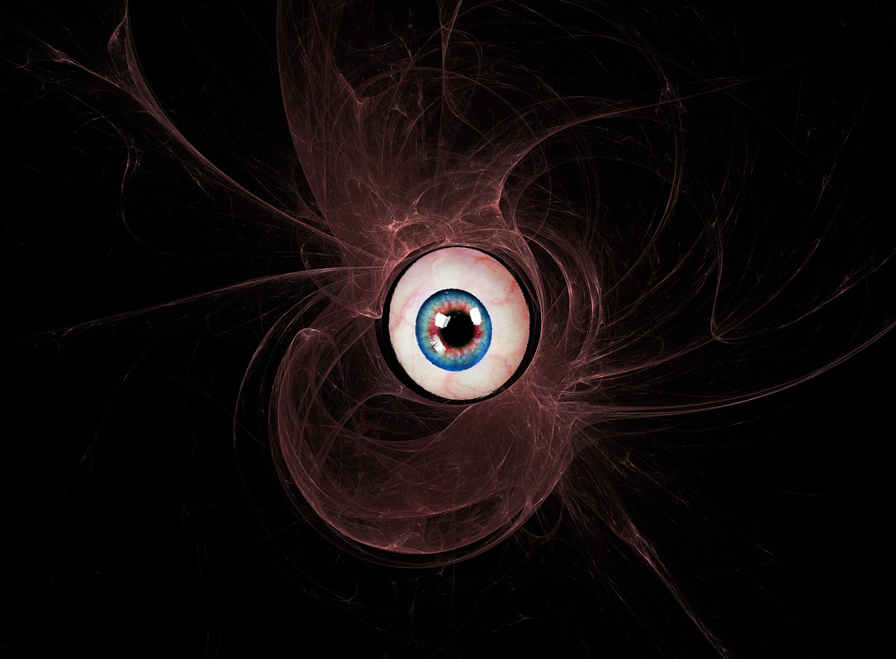 A floating eye in a jellylike maroon mass with extending pseudopods