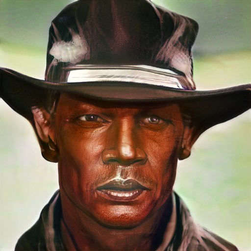 Face of a dark-skinned, middle-aged man wearing a black hat with a broad brim.